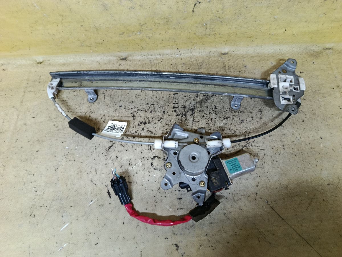 Стеклоподъемный механизм 80730-AX004 на Nissan March AK12 Фото 2