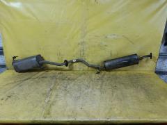 Глушитель на Nissan March AK12 CR12DE