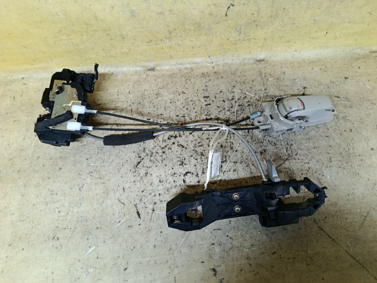 Замок двери на Nissan March AK12 Фото 3