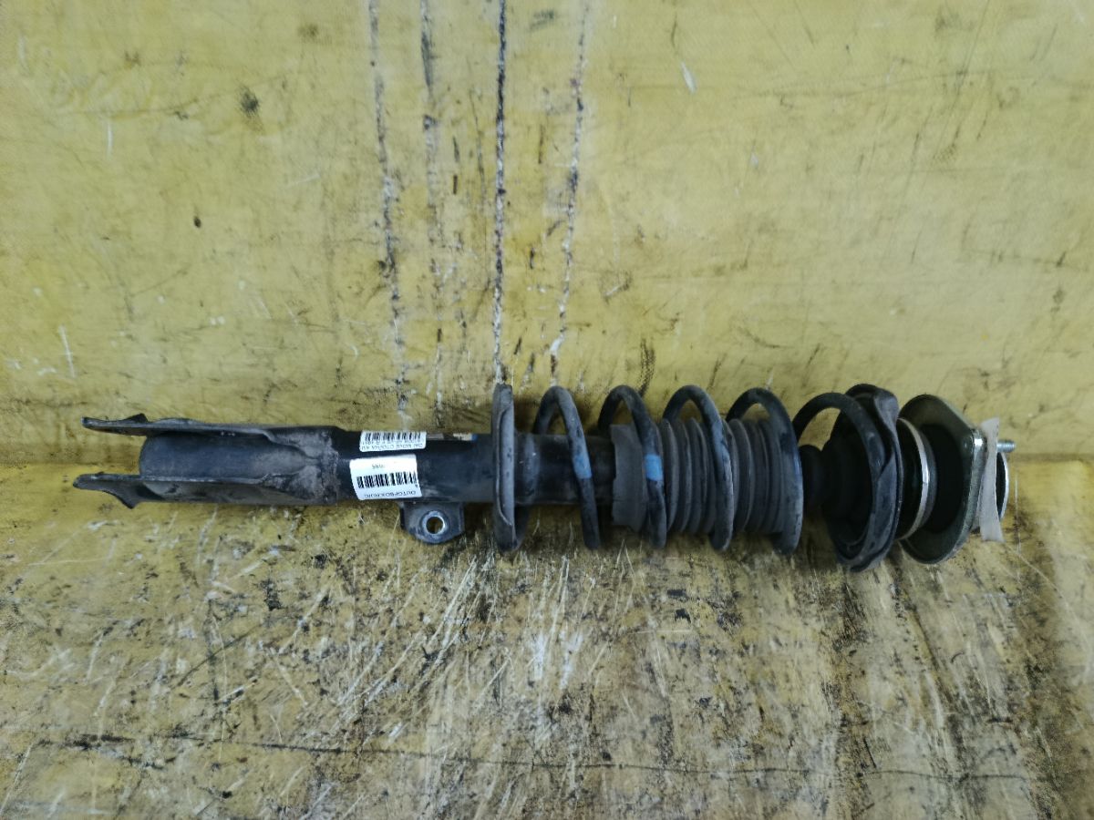 Стойка амортизатора 48510-B2A50 на Daihatsu Move LA100S KF-VE Фото 1