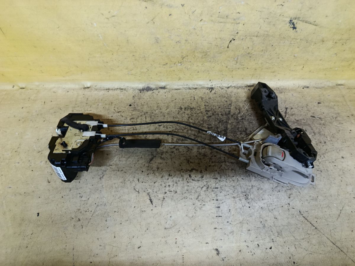Замок двери на Nissan March AK12 Фото 2