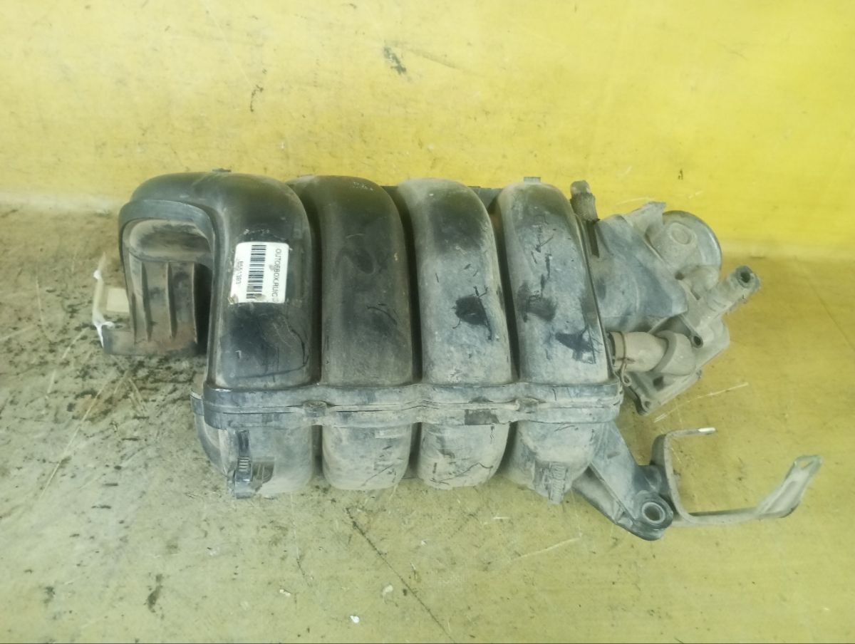 Коллектор впускной 22030-0T100 на Toyota Corolla ZZE150L 1ZR-FE Фото 1
