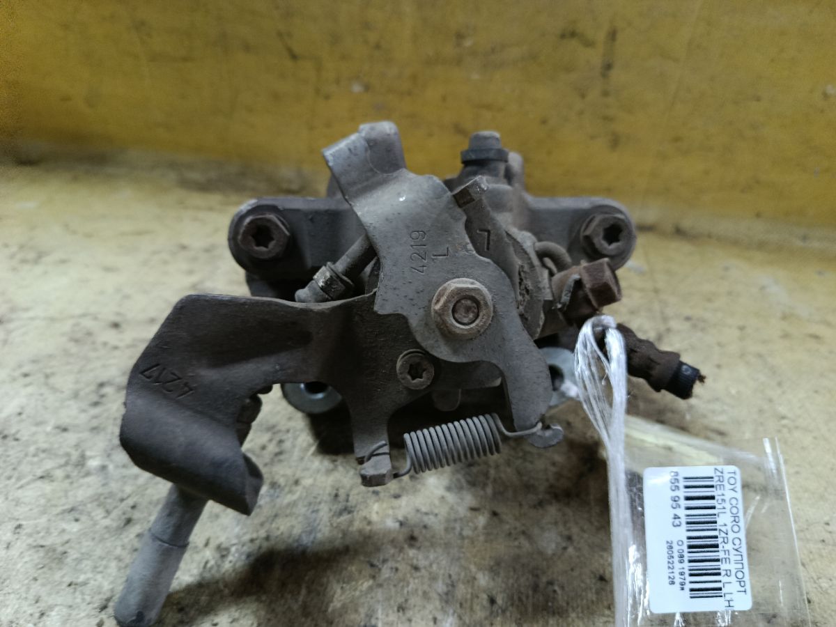 Суппорт на Toyota Corolla ZRE151L 1ZR-FE Фото 4