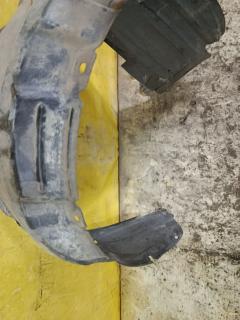 Подкрылок 53875-YK010 на Toyota Corolla ZRE120L 1ZR-FE Фото 4