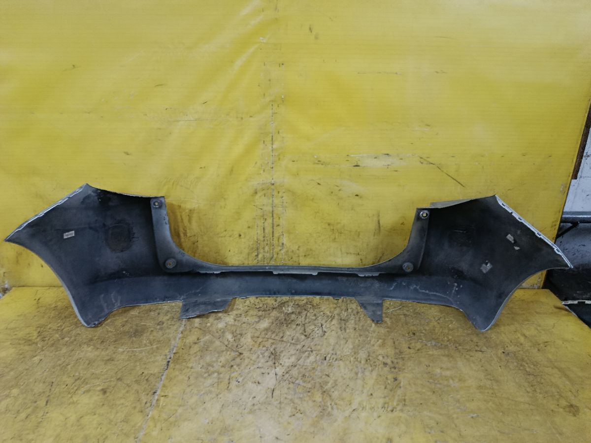 Бампер 52159-52600 на Toyota Ractis SCP100 Фото 6