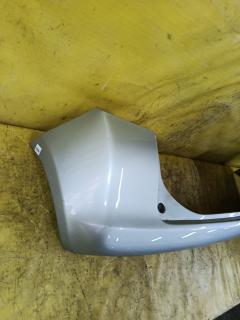 Бампер 52159-52600 на Toyota Ractis SCP100 Фото 4