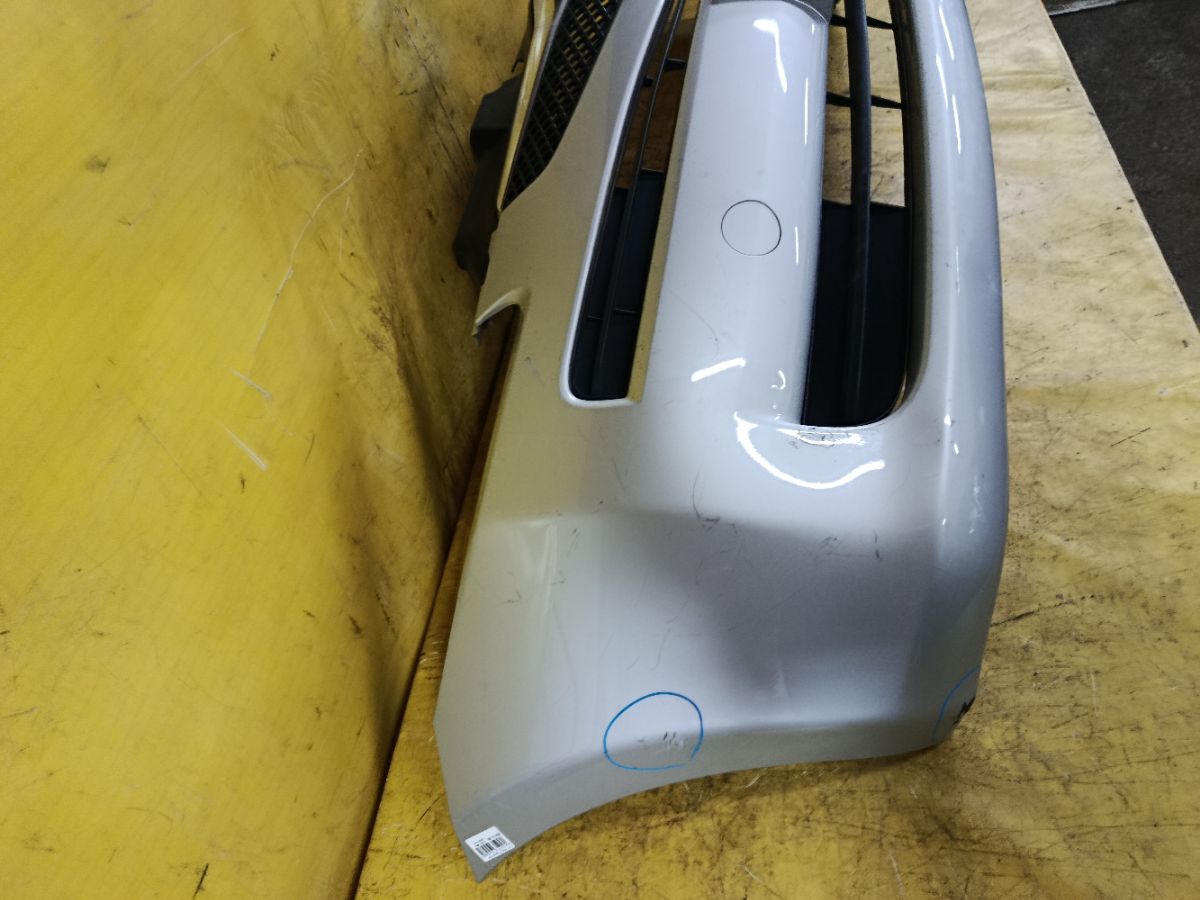 Бампер 52119-52480 на Toyota Ractis SCP100 Фото 4