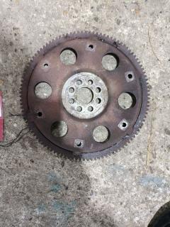 Маховик 32101-12090, 32101-12091 на Toyota Vista ZZV50 1ZZ-FE Фото 4