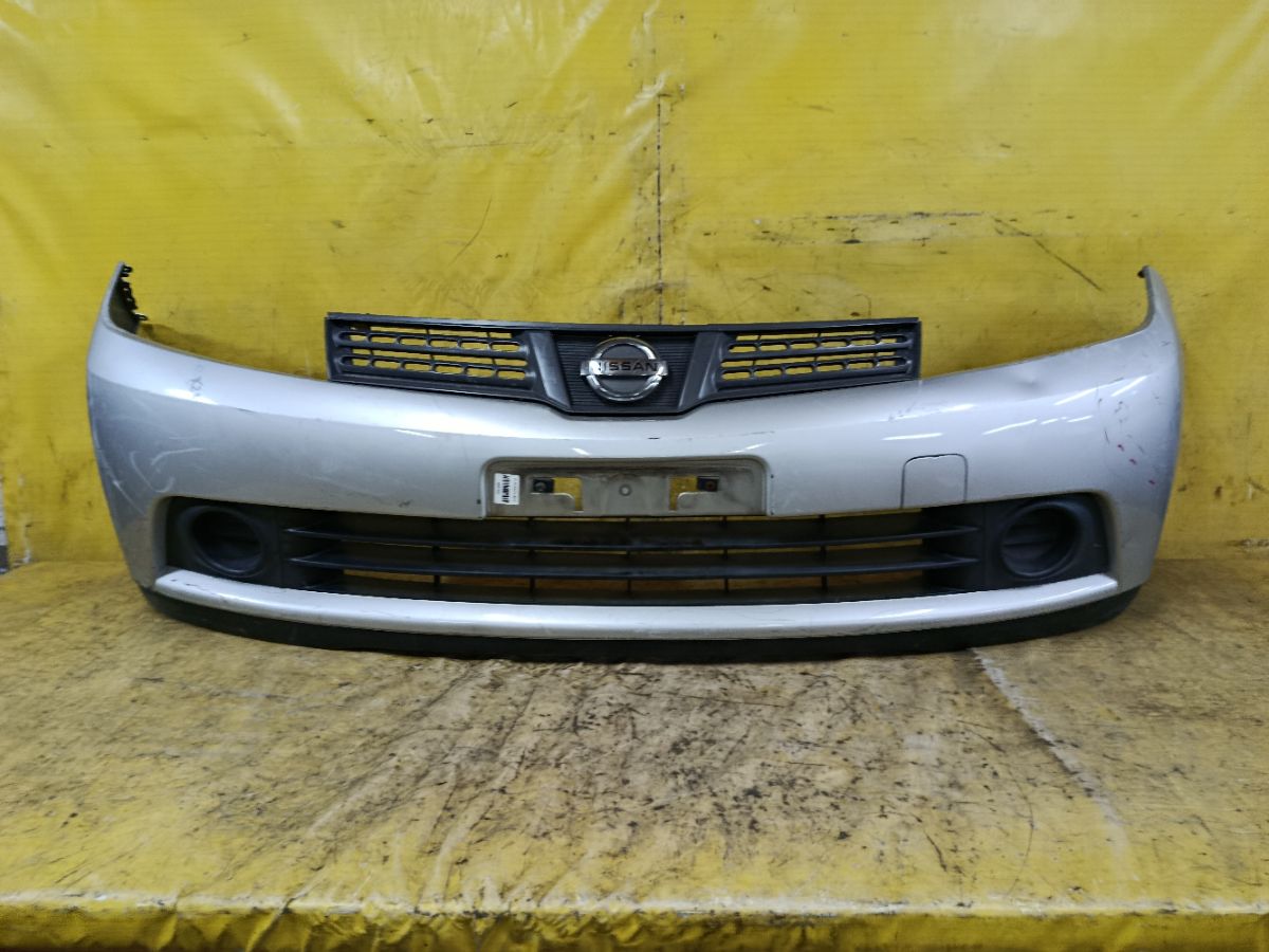 Бампер 62022-CV040 на Nissan Wingroad NY12 Фото 1