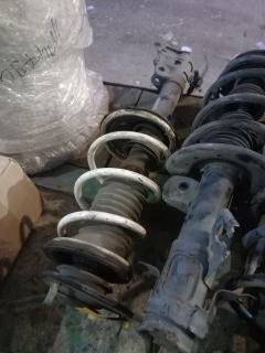 Стойка амортизатора на Toyota Bb NCP31 1NZ-FE Фото 3