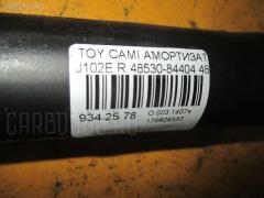 Амортизатор 48530-84404 на Toyota Cami J102E Фото 2