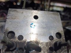 Блок ABS на Nissan Elgrand ATE50 ZD30DDTI Фото 12