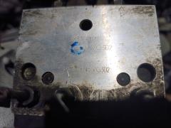 Блок ABS на Nissan Elgrand ATE50 ZD30DDTI Фото 13