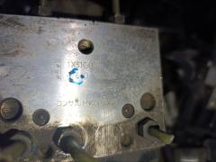 Блок ABS на Nissan Elgrand ATE50 ZD30DDTI Фото 14