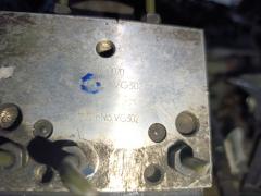 Блок ABS на Nissan Elgrand ATE50 ZD30DDTI Фото 15