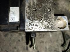 Блок ABS на Nissan Elgrand ATE50 ZD30DDTI Фото 9