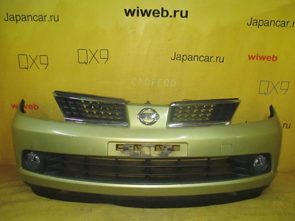 Nissan tiida бампер передний