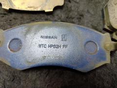 Тормозные колодки на Nissan Almera N16 QG16DE Фото 6