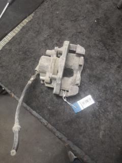 Суппорт D3Y0-33-99Z, D3Y0-33-99ZA, D3Y0-33-99ZB на Mazda Demio DY3W ZJ-VE Фото 3