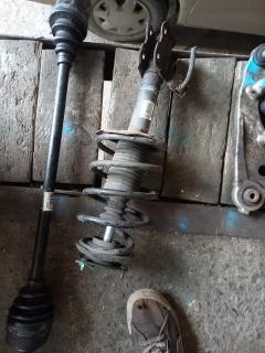 Стойка амортизатора на Nissan Sunny FB15 QG15DE Фото 2