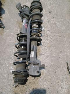 Стойка амортизатора на Nissan Note E12 HR12DDR Фото 2