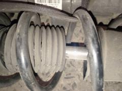 Стойка амортизатора на Nissan Note E12 HR12DDR Фото 4