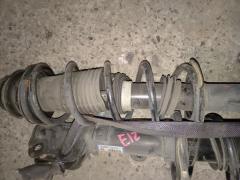 Стойка амортизатора на Nissan Note E12 HR12DDR Фото 5