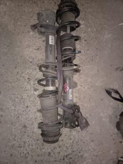 Стойка амортизатора на Nissan Note E12 HR12DDR Фото 7