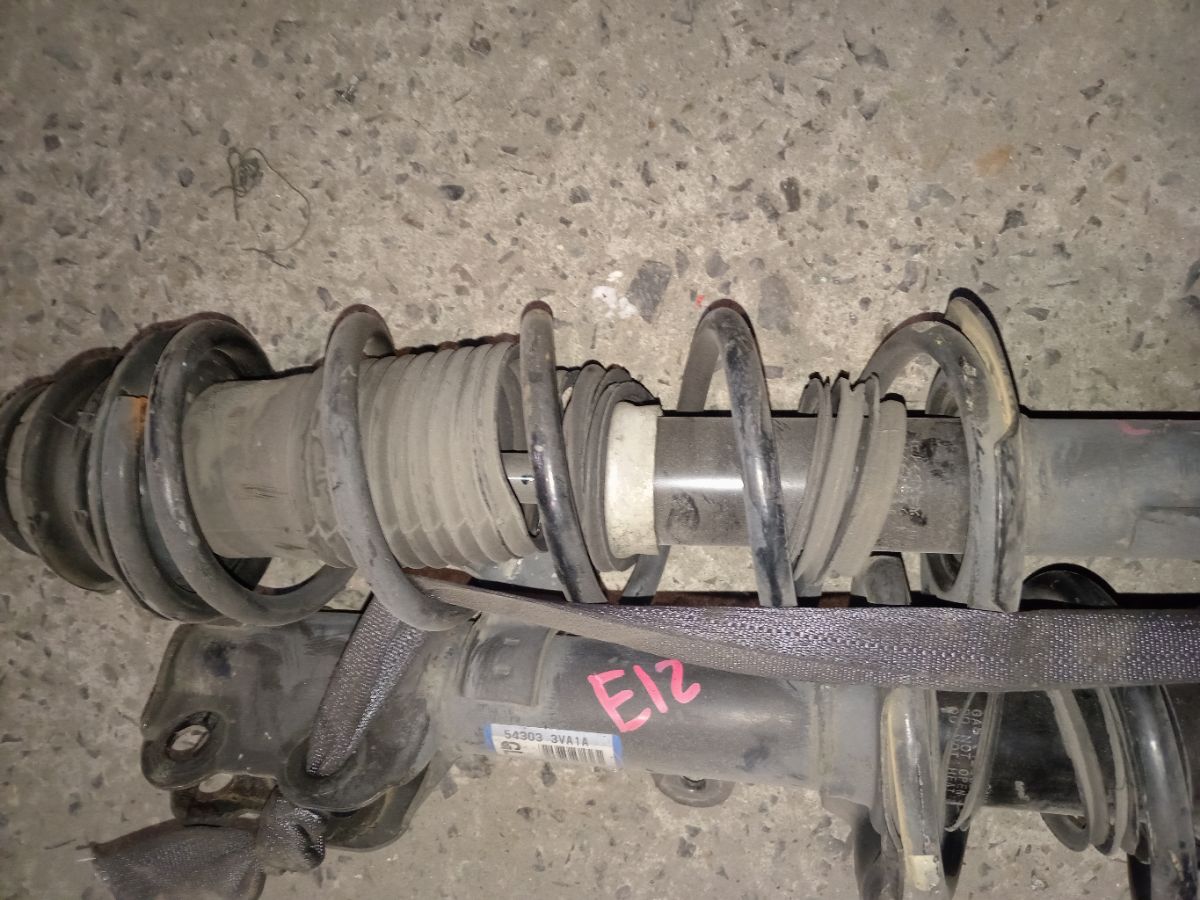 Стойка амортизатора на Nissan Note E12 HR12DDR Фото 5
