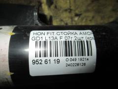 Стойка амортизатора на Honda Fit GD1 L13A Фото 3