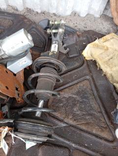 Стойка амортизатора 333428, 333473, 54303 EW81A, 54303 EX50A, 54303EW00A, 54303EW00B, 54303EW80A, 54303EW82A, 54303EW90B, CR-049-5433, E4303EW00A, E4303EW00B, E4303EX50A, E4C03EW00A, SJ-049-5433, SJ-049FL-G11, SST0173, ST-049-5433, ST-049FL-G11 на Nissan Bluebird Sylphy KG11 MR20DE Фото 2