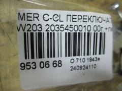 Переключатель поворотов 2035450010 на Mercedes-Benz C-Class W203 Фото 3