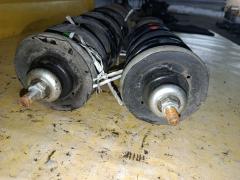 Стойка амортизатора 54302-5WK2A, 54303-5WK2A на Nissan Note HE12 HR12DE Фото 2