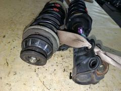 Стойка амортизатора 54302-5WK2A, 54303-5WK2A на Nissan Note HE12 HR12DE Фото 5