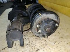Стойка амортизатора на Honda Element YH2 K24A Фото 3