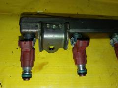 Форсунка инжекторная 16600-AX000 на Nissan March BK12 CR14DE Фото 3