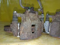 Суппорт на Toyota Noah AZR60G 1AZ-FSE Фото 7