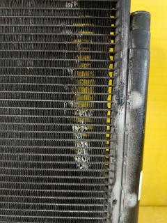 Радиатор кондиционера на Toyota Ipsum ACM21W 2AZ-FE Фото 2