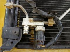 Радиатор кондиционера на Toyota Ipsum ACM21W 2AZ-FE Фото 4