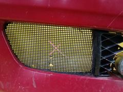 Бампер B25H-50031 на Mazda Familia S-Wagon BJ5W Фото 7