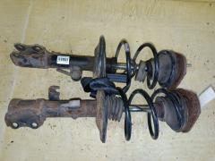 Стойка амортизатора на Toyota Corolla Fielder NZE144G 1NZ-FE, Переднее расположение