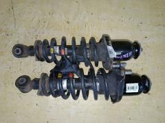 Стойка амортизатора на Toyota Corolla Fielder NZE144G 1NZ-FE, Заднее расположение