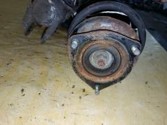 Стойка амортизатора на Nissan Wingroad WFY11 QG15DE Фото 5