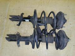 Стойка амортизатора на Mitsubishi Grandis NA4W 4G69 MR594341  MR594342, Переднее расположение