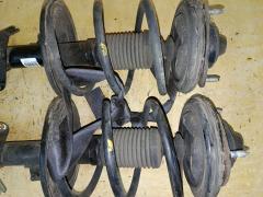 Стойка амортизатора MR594341, MR594342 на Mitsubishi Grandis NA4W 4G69 Фото 4