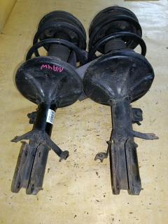 Стойка амортизатора MR594341, MR594342 на Mitsubishi Grandis NA4W 4G69 Фото 5