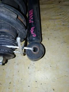 Амортизатор на Mitsubishi Grandis NA4W Фото 3