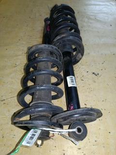 Амортизатор на Mitsubishi Grandis NA4W Фото 4