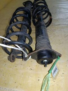 Амортизатор на Nissan Teana TNJ32 Фото 2