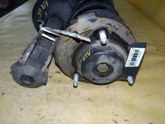 Стойка амортизатора на Toyota Noah AZR65G 1AZ-FSE Фото 2